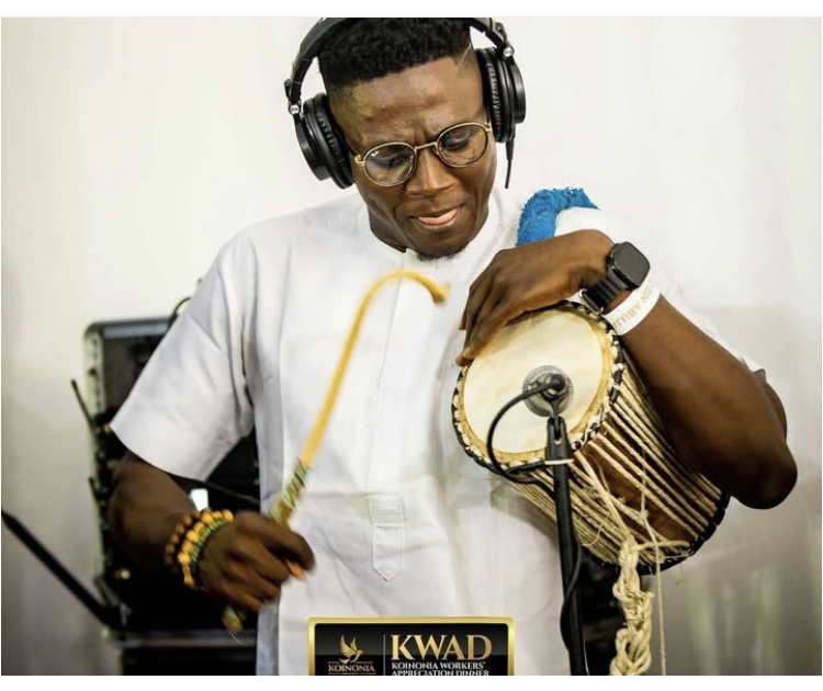 A drummer at KWAD